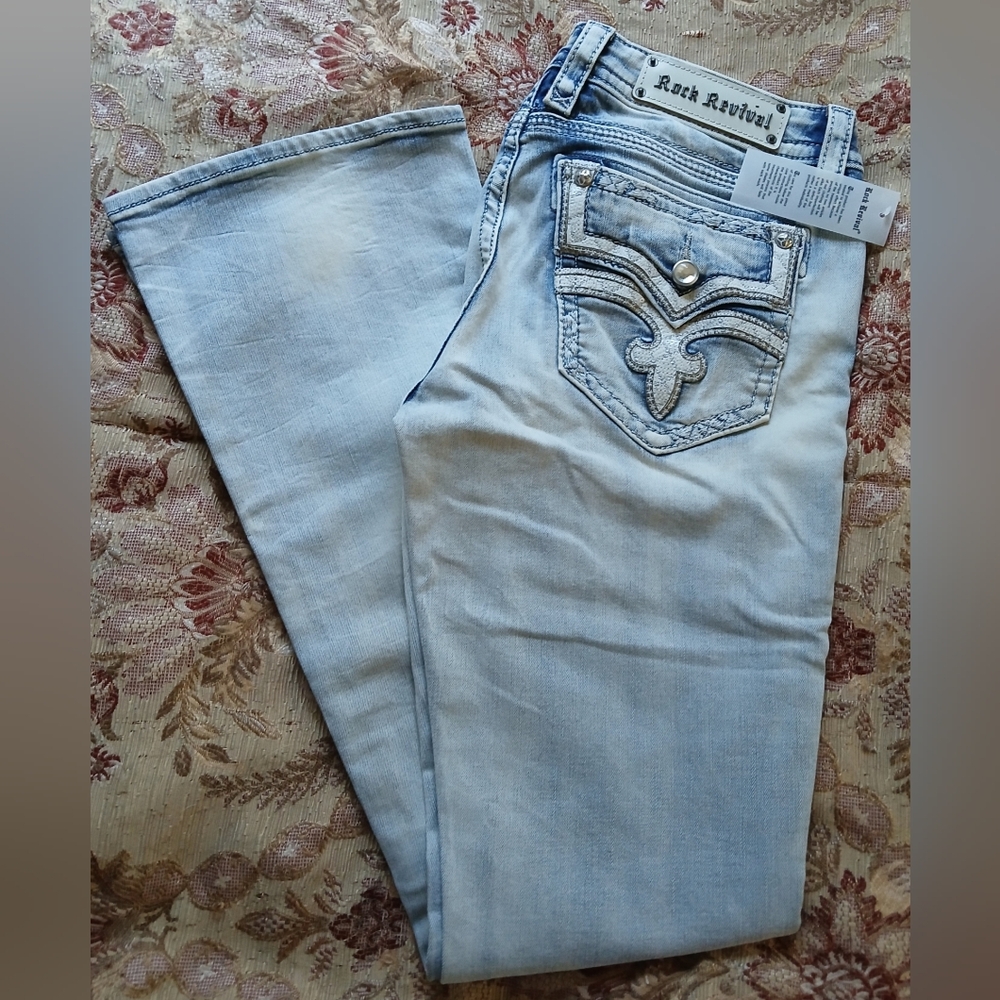 Rock Revival Raven Boot Cut Jeans Light Wash Denim W/ Signature Embellishments